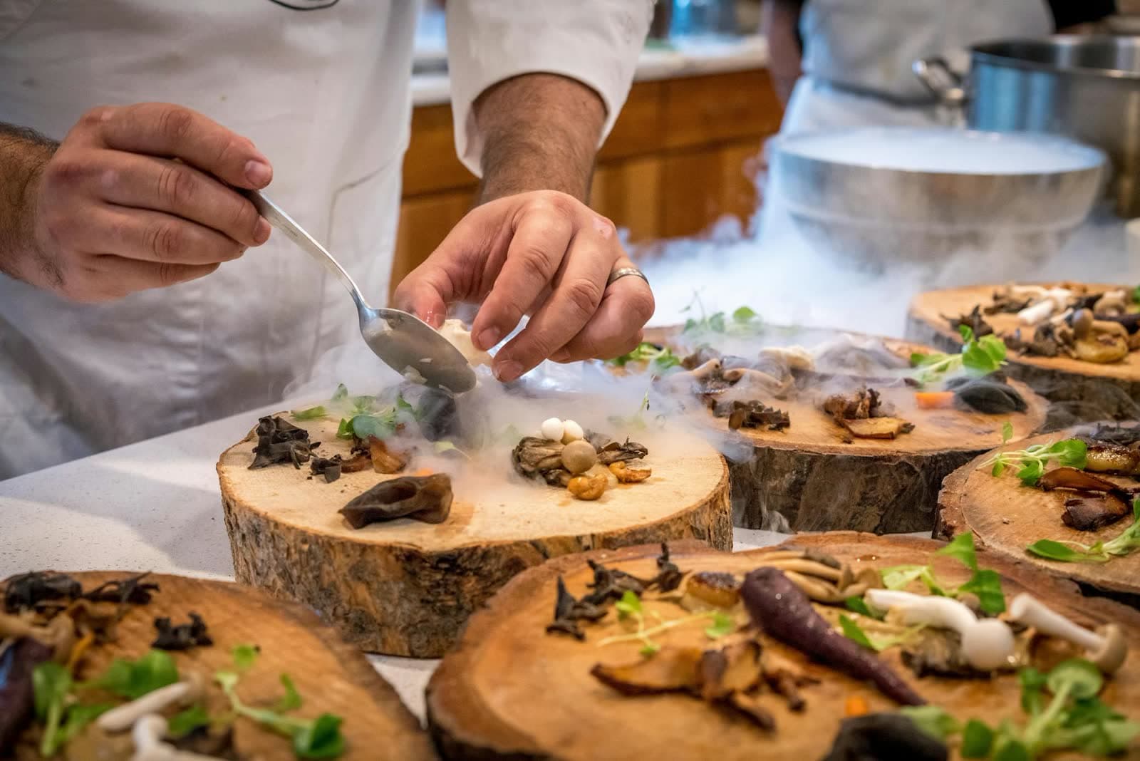 A light tasting spread on the bow of a motor yacht at golden hour.